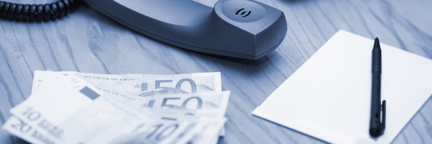 Heap of the money on office table Heap of money banknotes on the office table